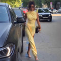 Figure-hugging Pleated Dress With A Slit And Fluttering Ribbons