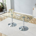 A Glass Tabletop With 71x35.4 Inches And A Modern Minimalist Circular Dining Table With Electroplated Silver Metal Legs. Suitable For Restaurants, Living Rooms.